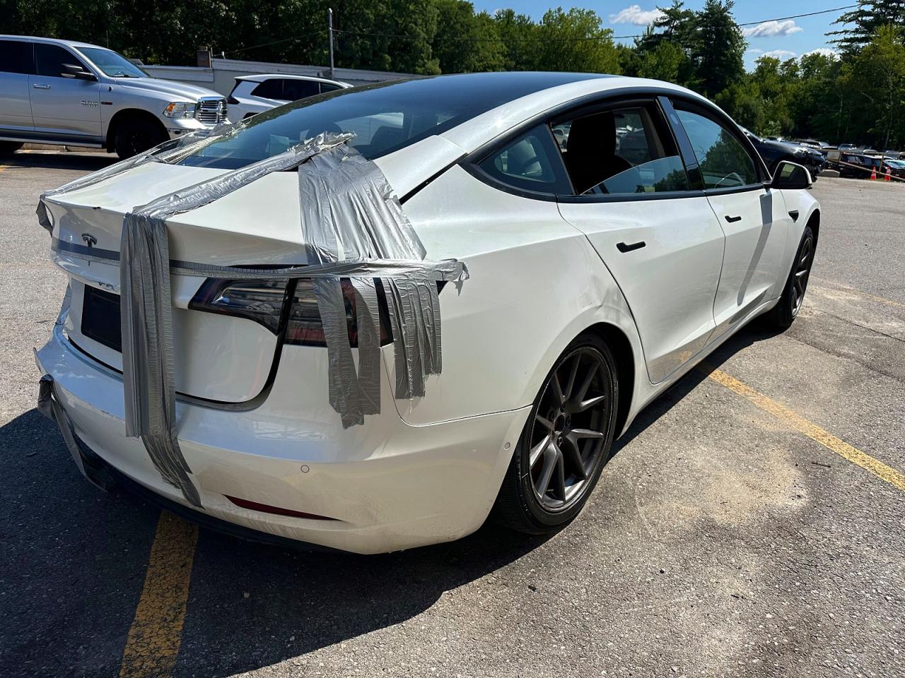 2021 Tesla Model 3 VIN 5YJ3E1EA9MF857852 COPART salvage auction — Rear End, VA - CERTIFICATE OF TITLE, sold $8,300 on 2026-09-15 (photo 3)