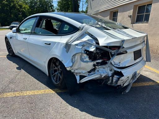 2021 Tesla Model 3 VIN 5YJ3E1EA9MF857852 COPART salvage auction — REAR END, Va - Certificate Of Title, sold $7,800 on 2026-09-23 (photo 2)