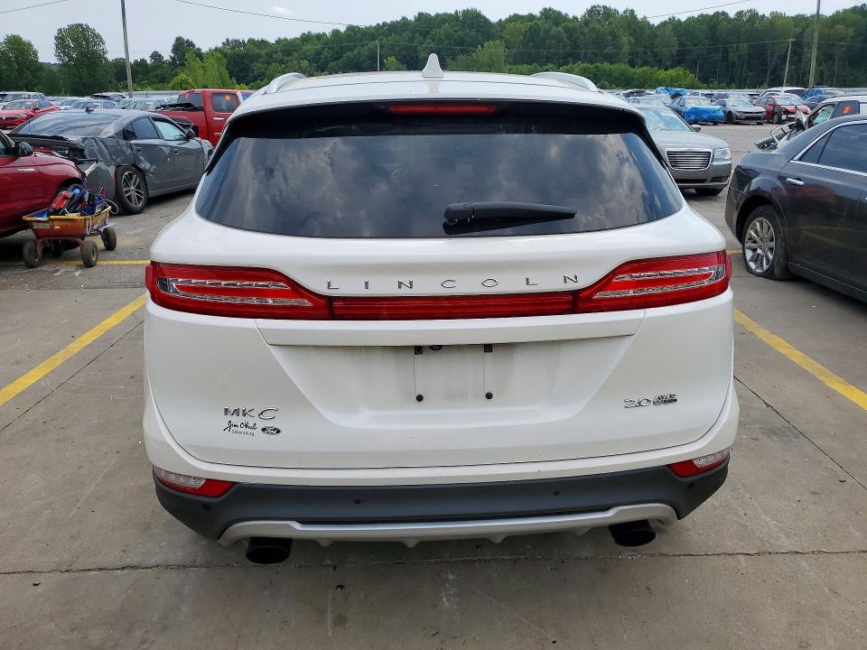 2016 Lincoln Mkc VIN 5LMCJ3D91GUJ32023 COPART salvage auction — MINOR DENT/SCRATCHES, In - Certificate Of Title, sold $1,350 on 2026-09-29 (photo 6)