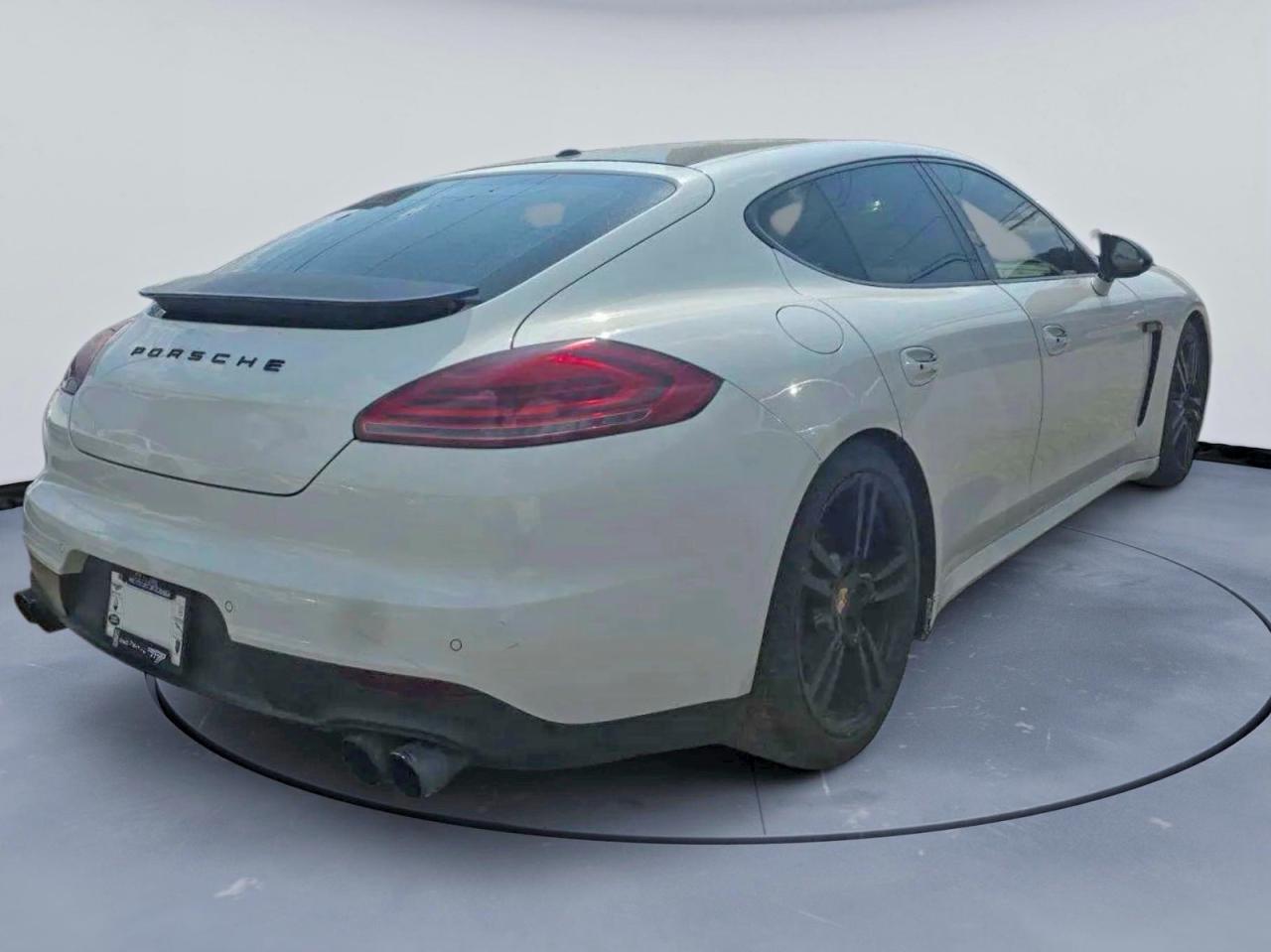 2015 Porsche Panamera VIN WP0AA2A72FL000498 COPART salvage auction — Normal Wear, GA - CERTIFICATE OF TITLE (P), sold $9,500 on 2026-09-03 (photo 4)