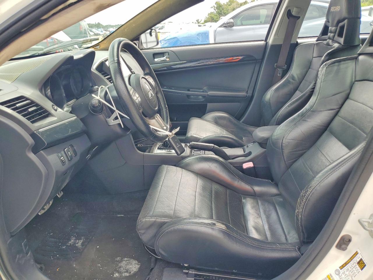 2013 Mitsubishi Lancer VIN JA32W5FV2DU011733 COPART salvage auction — Front End, FL - CERTIFICATE OF TITLE, sold $13,900 on 2026-09-09 (photo 7)