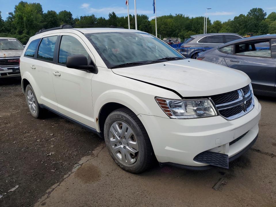 2015 Dodge Journey VIN 3C4PDCAB2FT587365 COPART salvage auction — MINOR DENT/SCRATCHES, Wv - Certificate Of Title, sold $800 on 2026-10-15 (photo 4)