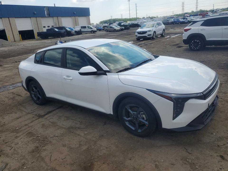 2026 Kia K4 VIN 3KPFT4DE1TE277332 COPART salvage auction — SIDE, Fl - Dlr Only Salvage/Rebuildable (P), sold $9,100 on 2026-08-18 (photo 4)