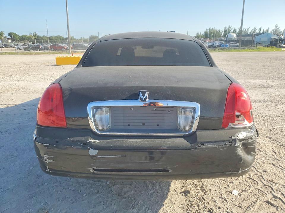 2007 Lincoln TOWN CAR VIN 1LNHM84W17Y637300 COPART salvage auction — REAR END, Fl - Cert Of Title Slvg Rebuildable, sold $350 on 2026-09-08 (photo 6)