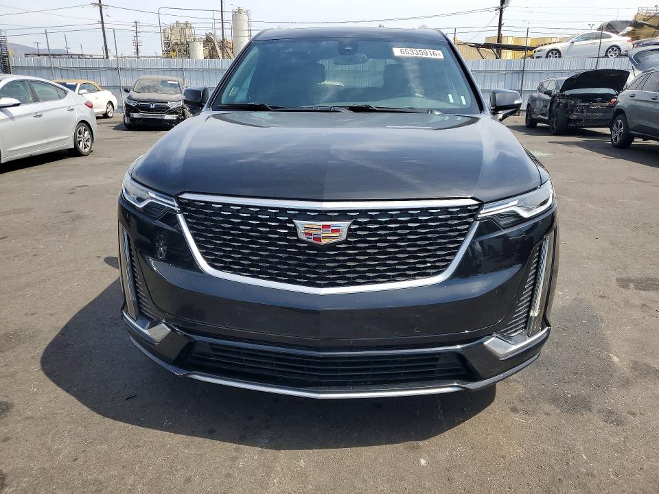 2023 Cadillac Xt6 VIN 1GYKPCRS4PZ220185 COPART salvage auction — SIDE, Ca - Salvage Certificate (P), sold $10,800 on 2026-08-26 (photo 5)