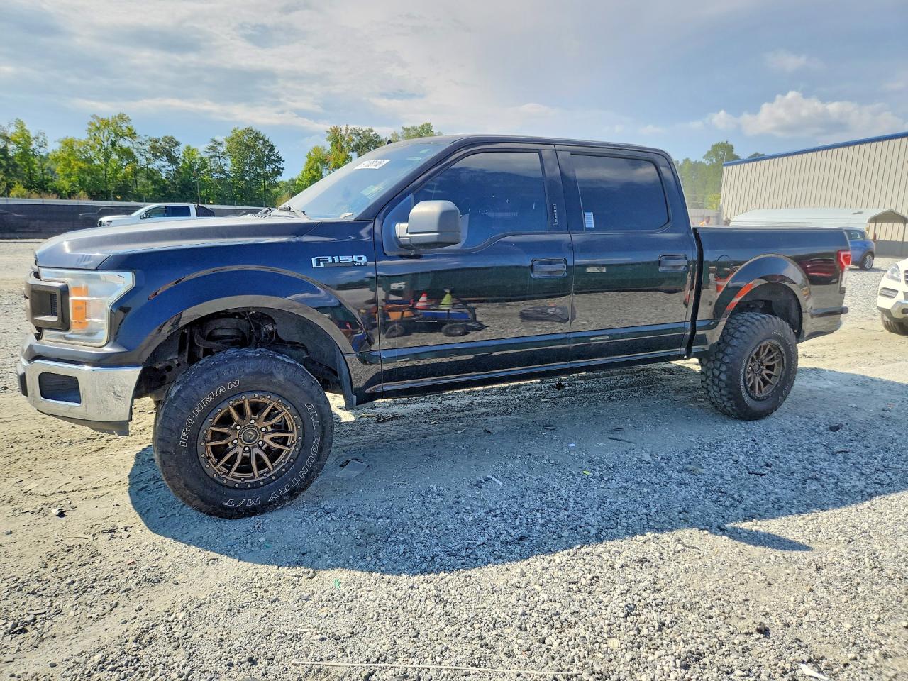 2020 Ford F-150 Lightning VIN 1FTEW1C5XLFA22350 — COPART salvage auction photo