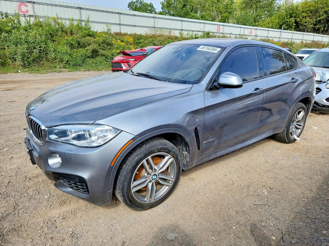 2017 BMW X6 VIN 5UXKU6C32H0S99779 — COPART salvage auction photo