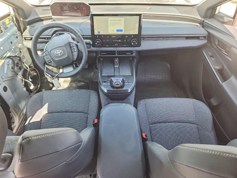 2026 Toyota Bz4x VIN JTMBCAEBXTJ007147 COPART salvage auction — SIDE, Tx - Salvage Vehicle Title, sold $10,600 on 2026-08-13 (photo 8)