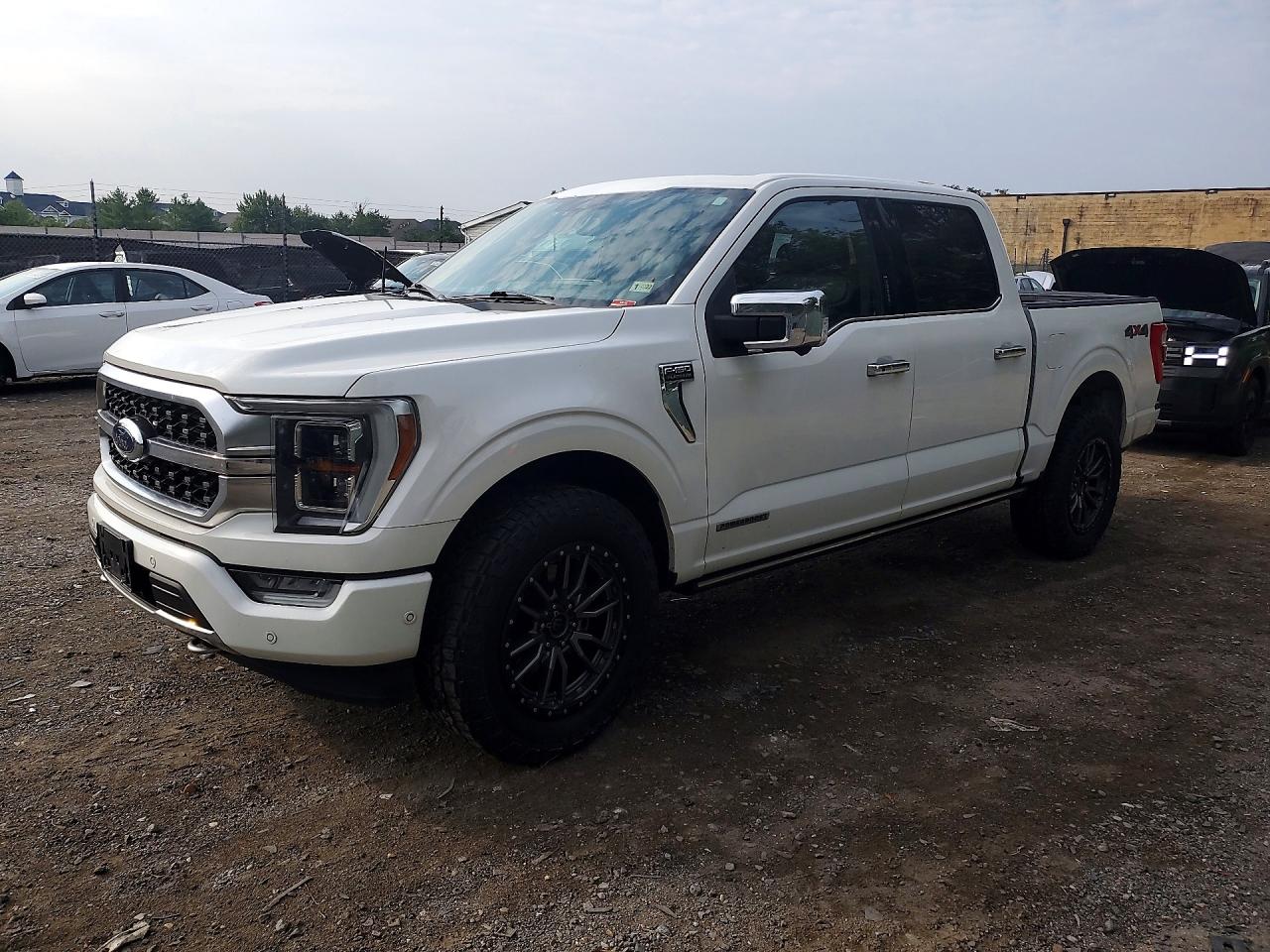 2021 Ford F-150 Lightning VIN 1FTFW1ED3MFA67026 — COPART salvage auction photo