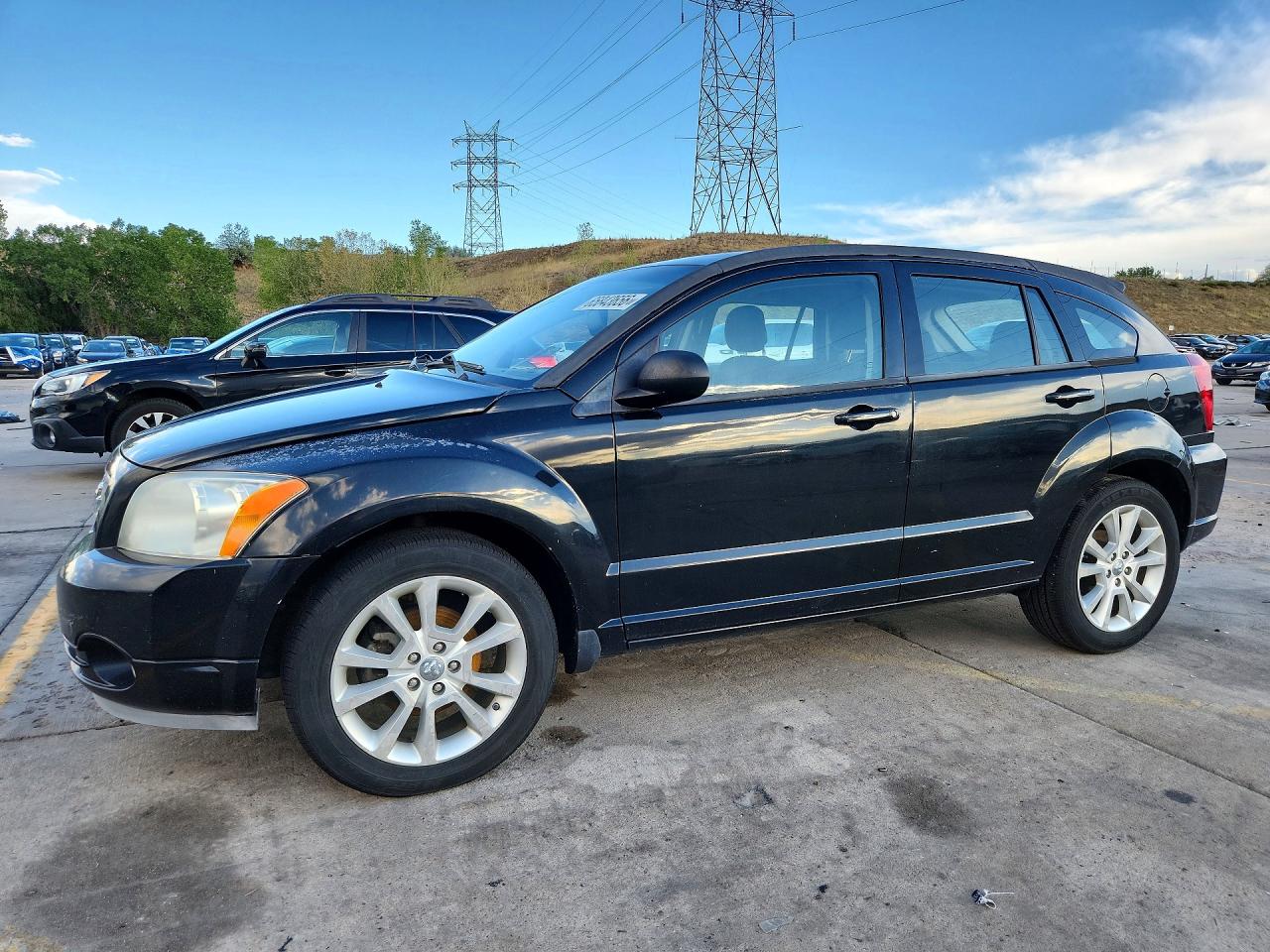 2012 Dodge Caliber VIN 1C3CDWEA1CD529562 COPART salvage auction — Side, Ct - Clean Title, sold $325 on 2026-09-04 (photo 1)