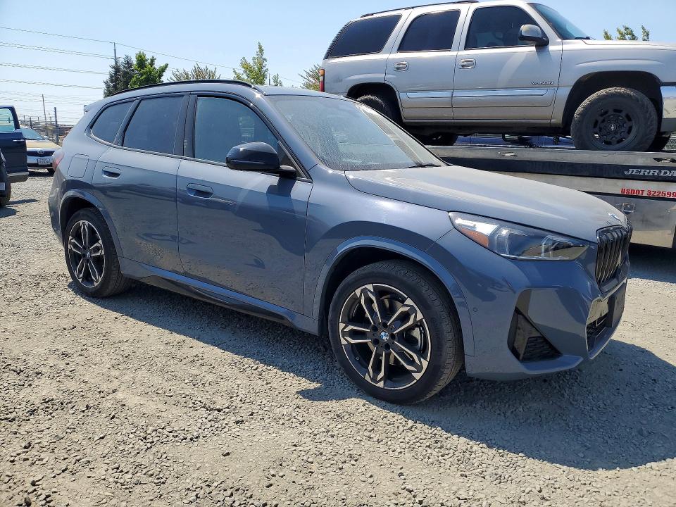 2023 BMW X1 VIN WBX73EF08P5W94012 COPART salvage auction — UNDERCARRIAGE, Or - Salvage Title Certificate, sold $20,700 on 2026-09-15 (photo 4)