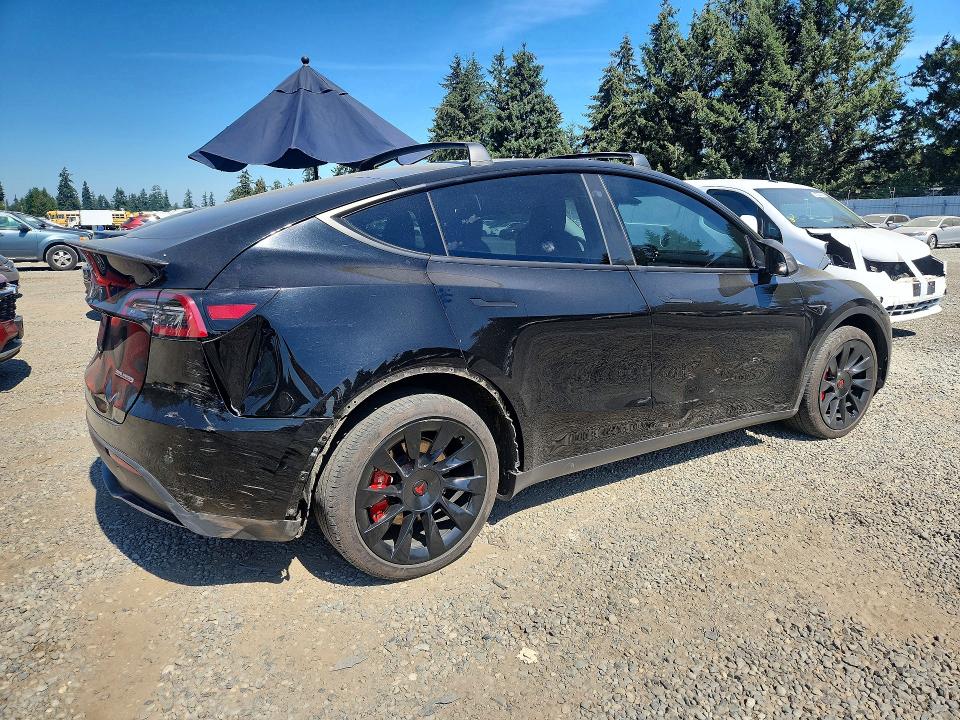 2023 Tesla Model y VIN 7SAYGDEE0PA105031 COPART salvage auction — REAR END, WA - BILL OF SALE, sold $15,700 on 2026-08-28 (photo 3)