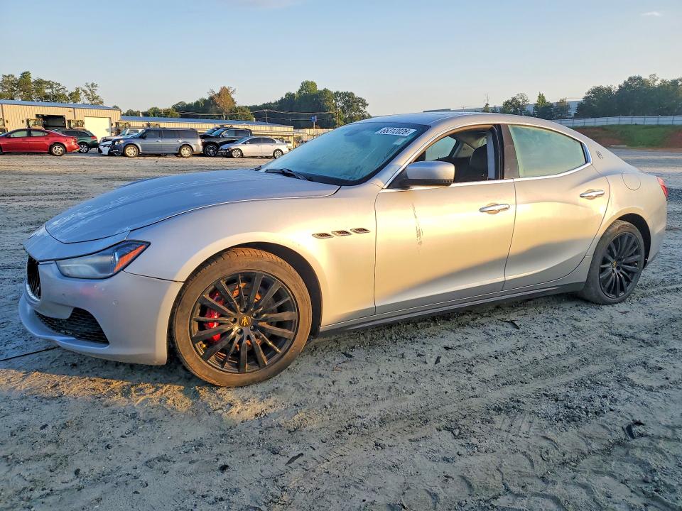 2014 Maserati Ghibli VIN ZAM57RTA5E1087823 COPART salvage auction — FRONT END, Ga - Certificate Of Title, sold $2,350 on 2026-08-19 (photo 1)