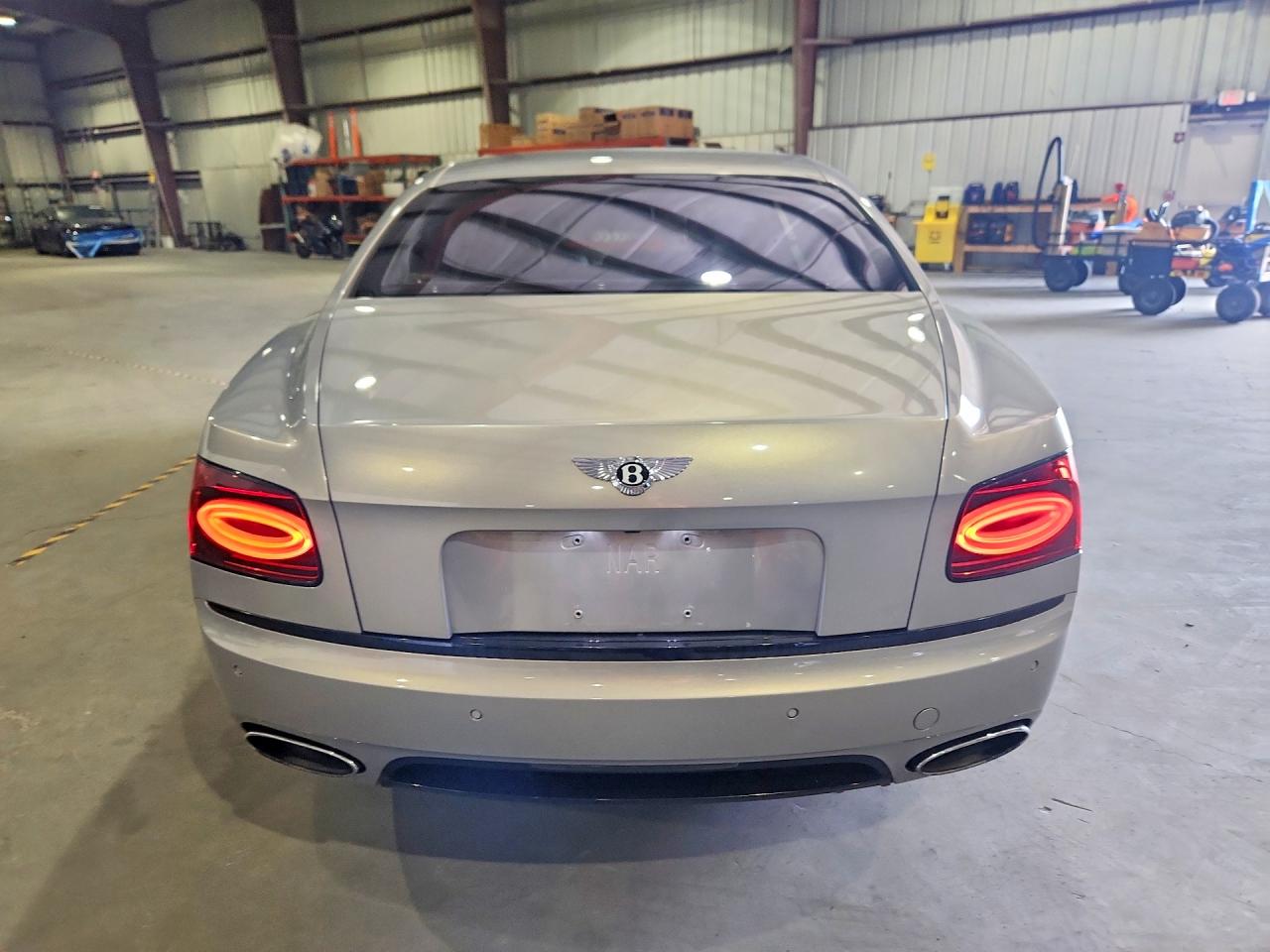 2017 Bentley Flying spur VIN SCBEJ9ZA7HC063466 COPART salvage auction — Minor Dent/Scratches, FL - CERT OF TITLE-REBUILT, sold $28,250 on 2026-08-31 (photo 6)