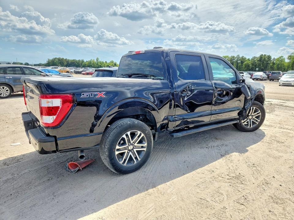 2023 Ford F-150 lightning VIN 1FTEW1C52PKF38909 COPART salvage auction — SIDE, TX - SALVAGE VEHICLE TITLE, sold $13,100 on 2026-08-21 (photo 3)