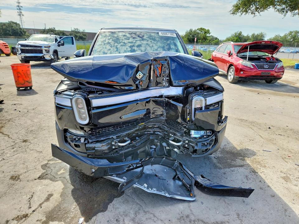 2023 Rivian R1s VIN 7PDSGABA2PN026301 COPART salvage auction — FRONT END, Fl - Cert Of Title Slvg Rebuildable, sold $14,100 on 2026-09-22 (photo 5)