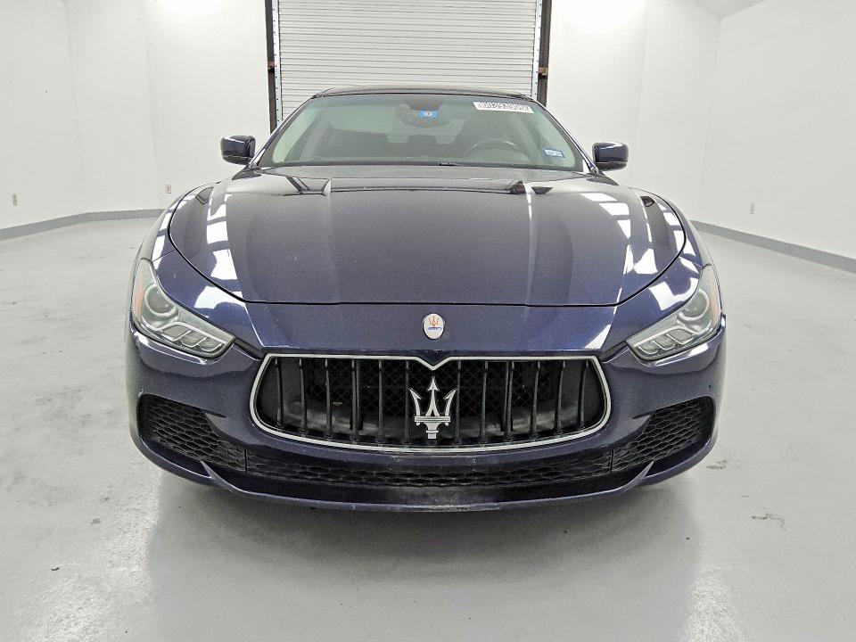 2016 Maserati Ghibli VIN ZAM57RTA2G1183833 COPART salvage auction — MECHANICAL, Tx - Certificate Of Title, sold $1,050 on 2026-08-18 (photo 5)