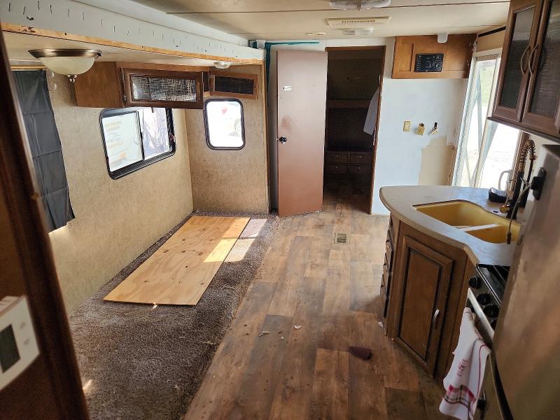 2016 Forest River Wildwood VIN 4X4TWDM29G8801076 COPART salvage auction — SIDE, TX - SALVAGE VEHICLE TITLE, sold $3,000 on 2026-10-08 (photo 5)