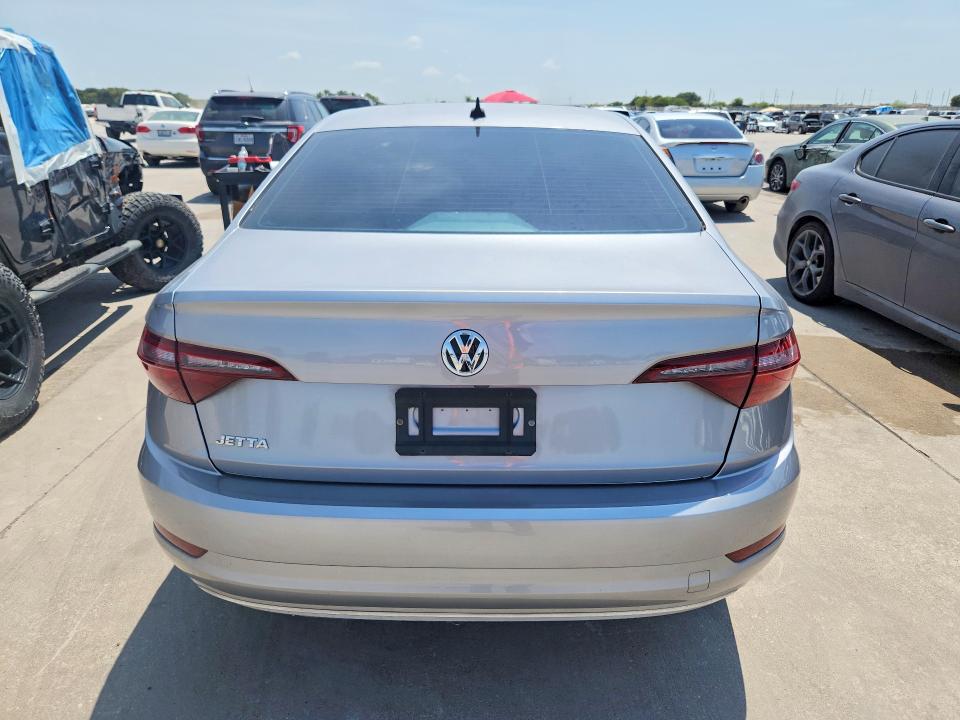 2021 Volkswagen Jetta VIN 3VWE57BUXMM088877 COPART salvage auction — SIDE, Tx - Salvage Vehicle Title, sold $8,100 on 2026-08-24 (photo 6)