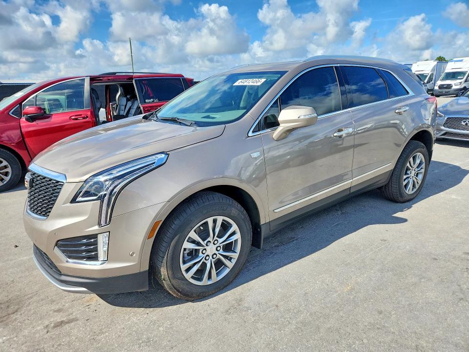 2022 Cadillac Xt5 VIN 1GYKNCRS6NZ164687 COPART salvage auction — WATER/FLOOD, FL - CERT OF TITLE-SLVG REBLD FLOOD (P), sold $3,450 on 2026-08-20 (photo 1)