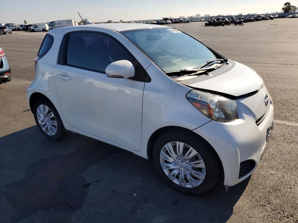 2012 Scion Iq VIN JTNJJXB01CJ013731 COPART salvage auction — MINOR DENT/SCRATCHES, Ca - Dis/Dlr/Exp Only Clean Title (P), sold $3,550 on 2026-08-26 (photo 4)