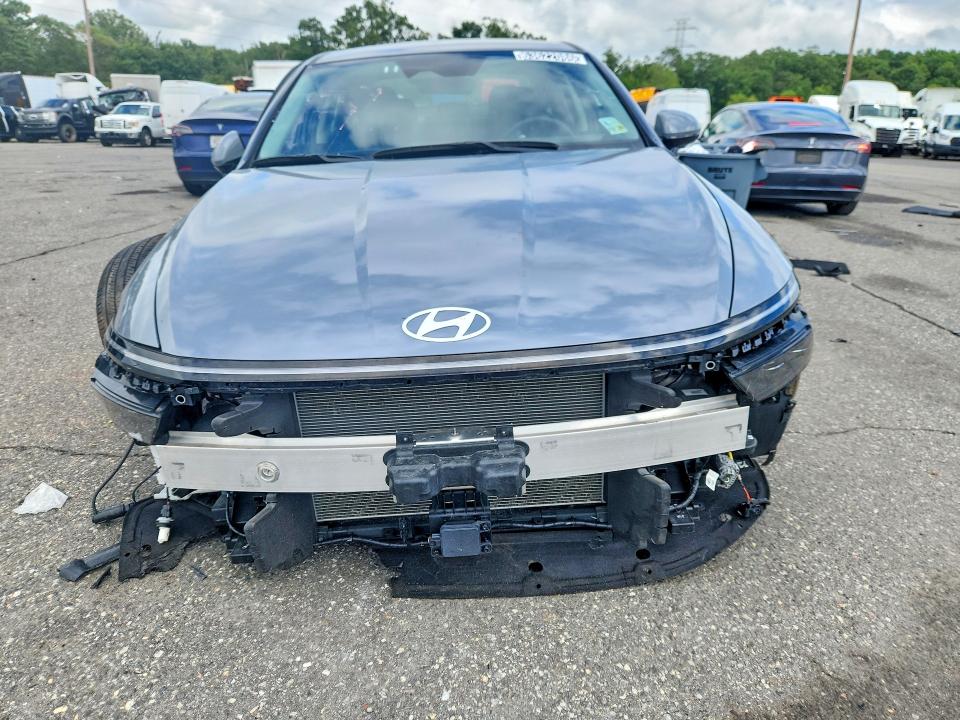 2025 Hyundai Sonata VIN KMHL64JA0SA462187 COPART salvage auction — UNDERCARRIAGE, Fl - Certificate Of Destruction, sold $7,400 on 2026-08-19 (photo 5)