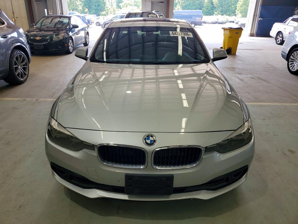 2016 BMW 3 series VIN WBA8A3C58GK551748 COPART salvage auction — MINOR DENT/SCRATCHES, MA - CERTIFICATE OF TITLE (P), sold $2,900 on 2026-08-20 (photo 5)