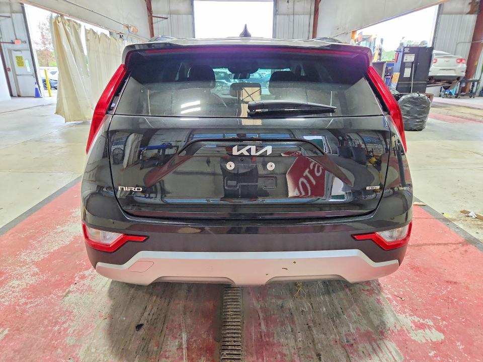 2025 Kia Niro VIN KNDCP3LE2S5306396 COPART salvage auction — SIDE, TX - SALVAGE VEHICLE TITLE, sold $7,400 on 2026-08-19 (photo 6)
