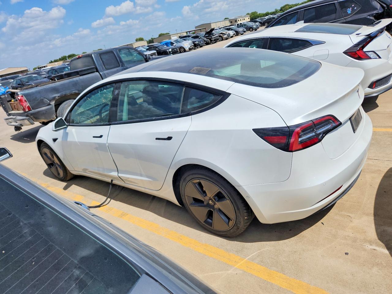 2021 Tesla Model 3 VIN 5YJ3E1EA8MF100280 COPART salvage auction — Minor Dent/Scratches, SC - CERTIFICATE OF TITLE, sold $9,700 on 2026-09-11 (photo 2)
