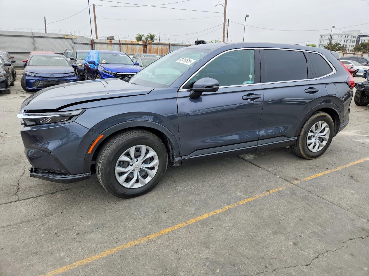 2023 Honda CR-V VIN 2HKRS3H22PH305988 — COPART salvage auction photo
