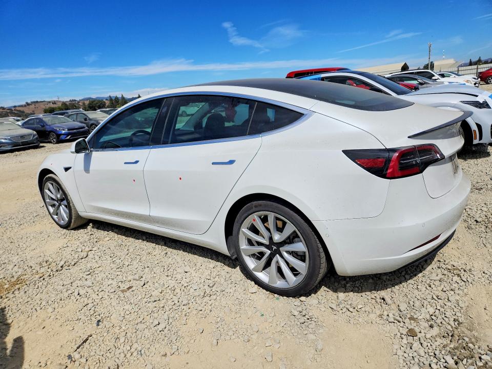 2017 Tesla Model 3 VIN 5YJ3E1EA3HF002053 COPART salvage auction — SIDE, Ca - Salvage Certificate, sold $6,900 on 2026-09-08 (photo 2)