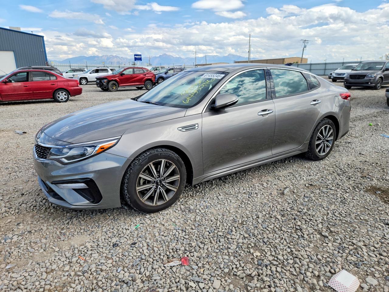 2019 Kia Optima VIN 5XXGU4L10KG321911 COPART salvage auction — Minor Dent/Scratches, UT - CERTIFICATE OF TITLE, sold $1,650 on 2026-08-21 (photo 1)
