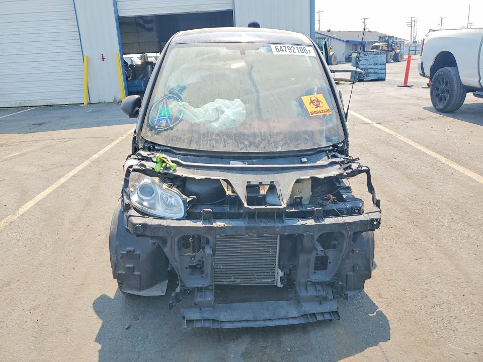 2009 Smart Fortwo VIN WMEEJ31X99K245883 COPART salvage auction — FRONT END, Id - Cert Of Title -Rebuilt Salvage, sold $90 on 2026-08-13 (photo 5)