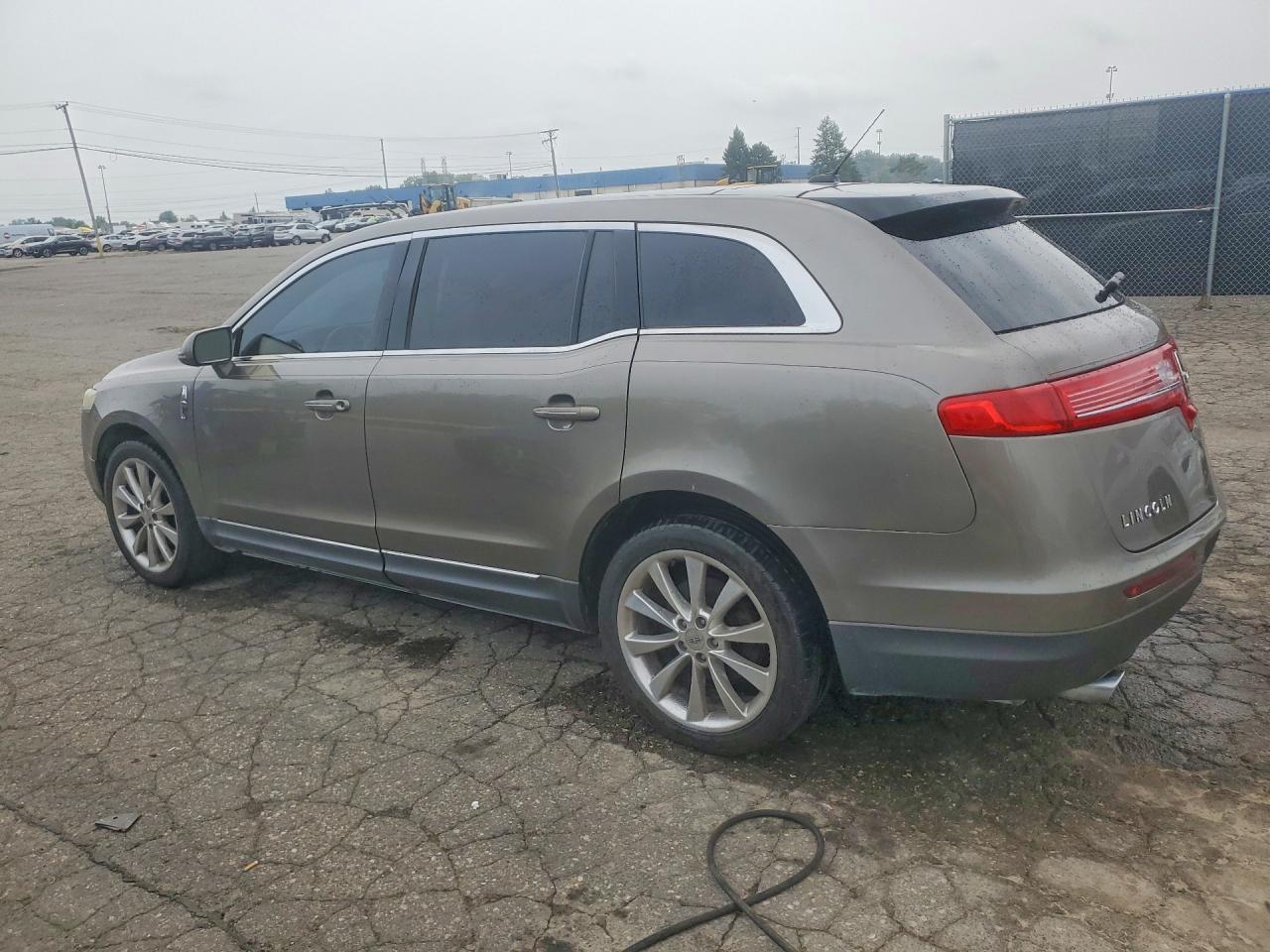 2012 Lincoln MKT VIN 2LMHJ5AT8CBL53224 COPART salvage auction — Minor Dent/Scratches, MI - CERTIFICATE OF TITLE, sold $1,100 on 2026-09-11 (photo 2)