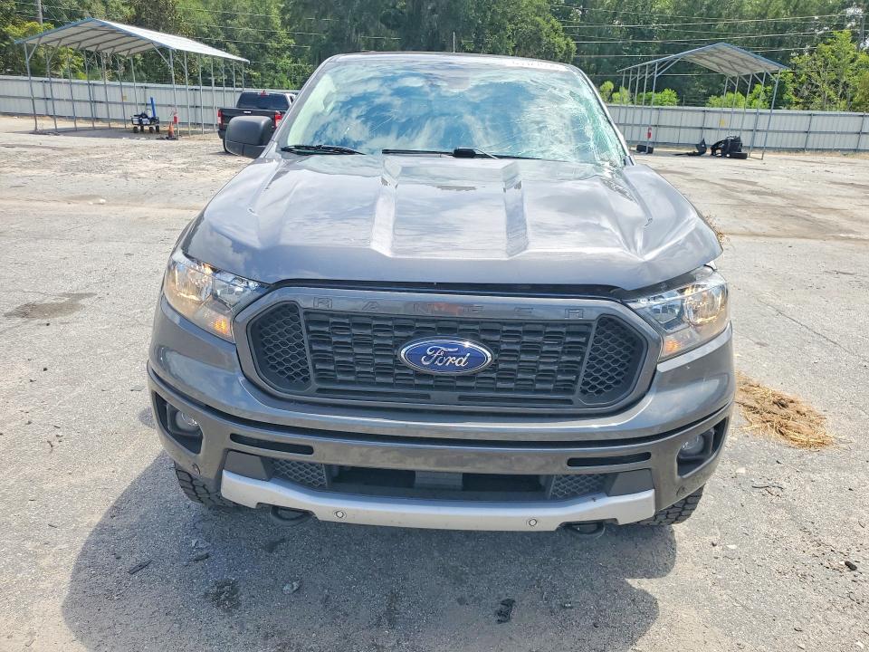 2023 Ford Ranger VIN 1FTER4EH2PLE16206 COPART salvage auction — SIDE, Salvage Title, sold $7,600 on 2026-08-20 (photo 5)