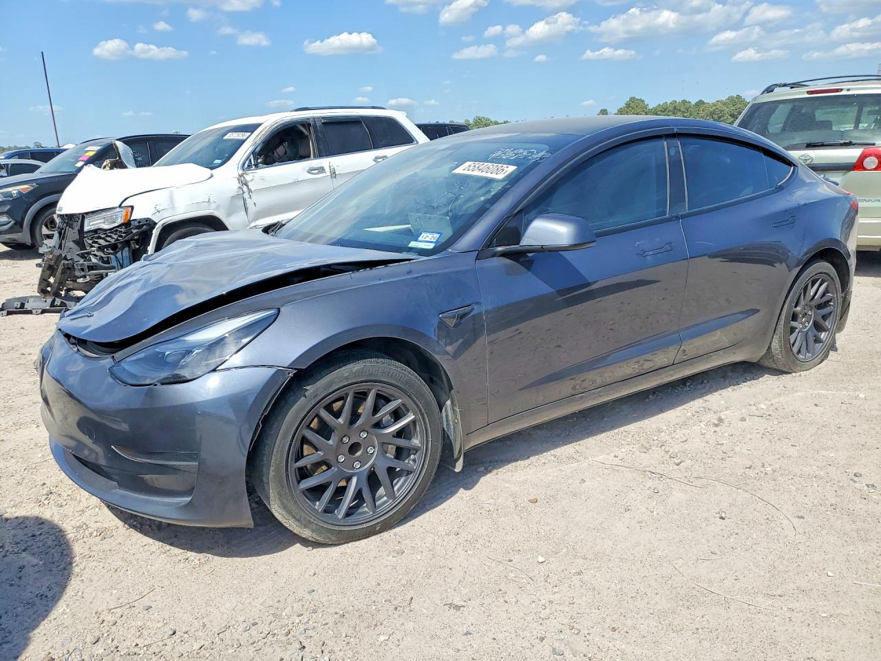 2023 Tesla Model 3 VIN 5YJ3E1EA1PF671615 — COPART salvage auction photo