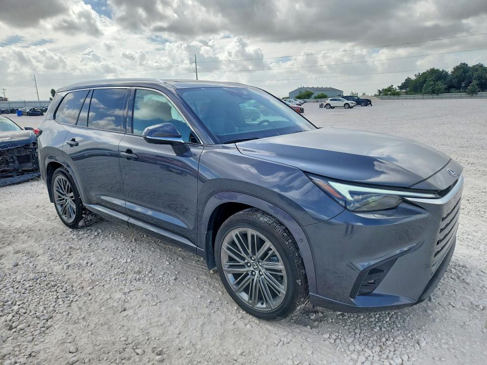 2024 Lexus Tx VIN 5TDAAAB61RS005484 COPART salvage auction — SIDE, Tx - Salvage Vehicle Title, sold $30,250 on 2026-08-27 (photo 4)