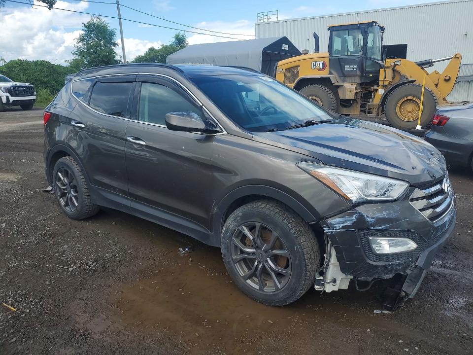 2014 Hyundai Santa fe VIN 5XYZUDLA0EG133253 COPART salvage auction — FRONT END, Qc - Gravement Accidente, sold $2,750 on 2026-09-08 (photo 4)