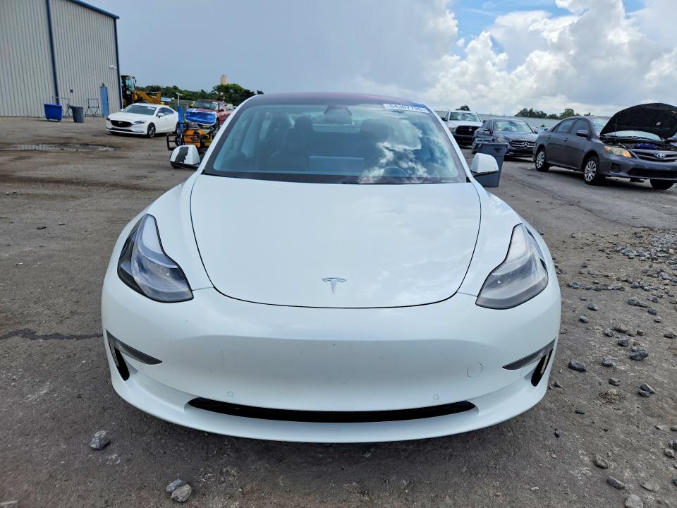 2021 Tesla Model 3 VIN 5YJ3E1EC2MF926480 COPART salvage auction — MINOR DENT/SCRATCHES, Fl - Cert Of Title-Rebuilt, sold $10,000 on 2026-08-28 (photo 5)