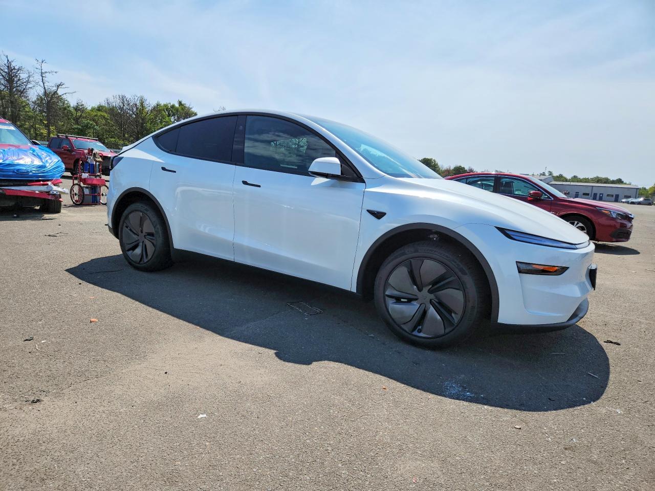 2026 Tesla Model Y VIN 7SAYGDEEXTA724973 COPART salvage auction — Rear End, Sm - Salvage Title, sold $26,250 on 2026-09-25 (photo 4)