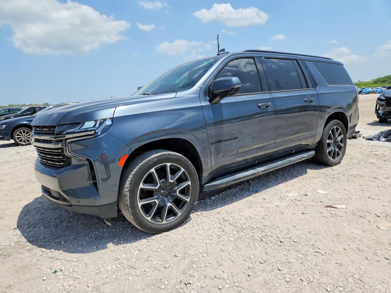 2021 Chevrolet Suburban VIN 1GNSCEKD7MR216787 — COPART salvage auction photo