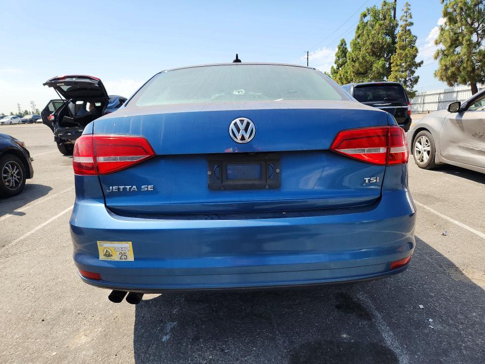 2015 Volkswagen Jetta VIN 3VWD17AJ6FM214010 COPART salvage auction — NORMAL WEAR, CA - DIS/DLR/EXP ONLY CLEAN TITLE, sold $1,155 on 2026-08-13 (photo 6)