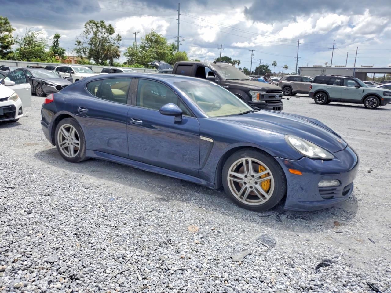 2013 Porsche Panamera VIN WP0AA2A76DL010237 COPART salvage auction — Minor Dent/Scratches, FL - CERTIFICATE OF TITLE, sold $5,500 on 2026-09-09 (photo 4)