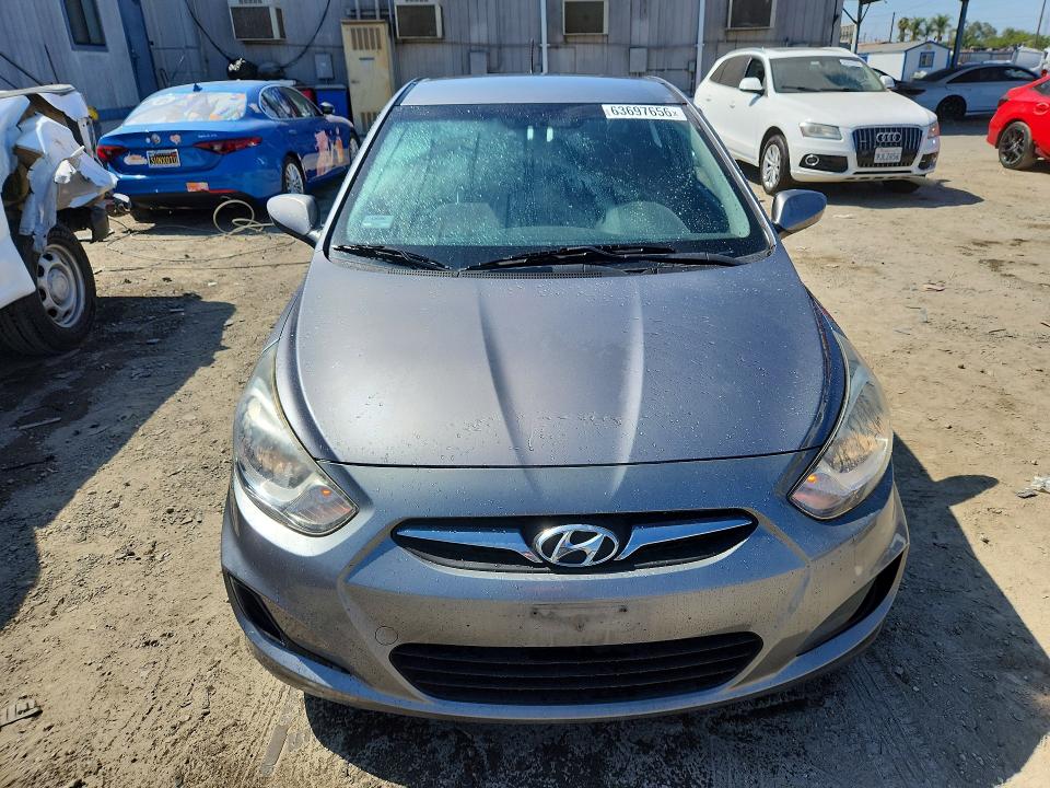 2014 Hyundai Accent VIN KMHCT5AE4EU141788 COPART salvage auction — NORMAL WEAR, Ca - Dis/Dlr/Exp Only Clean Title, sold $925 on 2026-08-20 (photo 5)