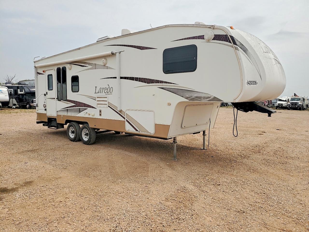 2009 Keystone Laredo VIN 4YDF265279L601027 COPART salvage auction — Hail, SD - CERTIFICATE OF TITLE, sold $2,499 on 2026-10-02 (photo 1)