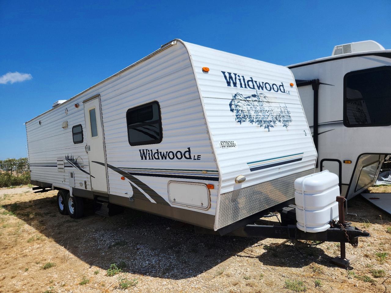 2006 Forest river Wildwood VIN 4X4TWDF276A236850 COPART salvage auction — Hail, Fv - Salvage Title, sold $125 on 2026-09-17 (photo 4)