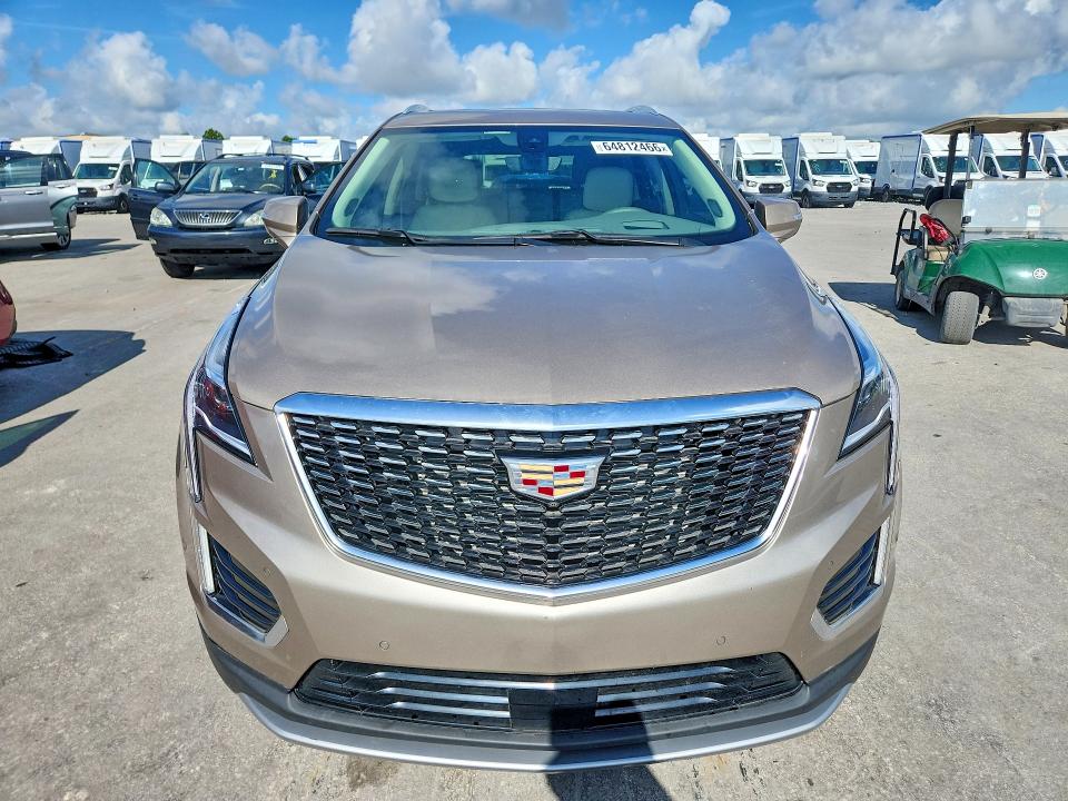 2022 Cadillac Xt5 VIN 1GYKNCRS6NZ164687 COPART salvage auction — WATER/FLOOD, FL - CERT OF TITLE-SLVG REBLD FLOOD (P), sold $3,450 on 2026-08-20 (photo 5)