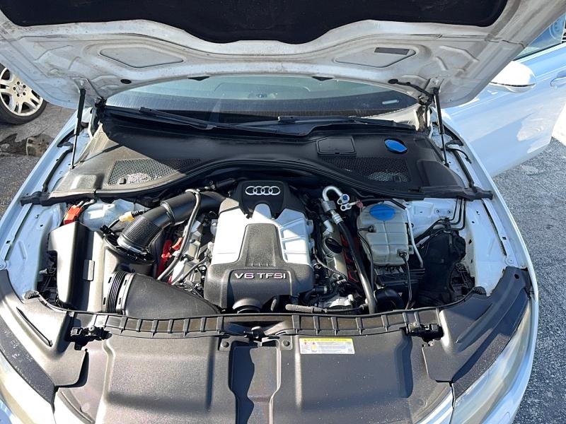 2014 Audi A7 VIN WAUWGAFC1EN030242 COPART salvage auction — MINOR DENT/SCRATCHES, La - Cert Of Title-Salvage Flood (P), sold $650 on 2026-09-09 (photo 7)