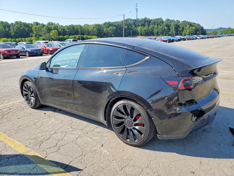 2023 Tesla Model y VIN 7SAYGDEF7PF846739 COPART salvage auction — SIDE, Md - Certificate Of Title (P), sold $4,150 on 2026-09-08 (photo 2)