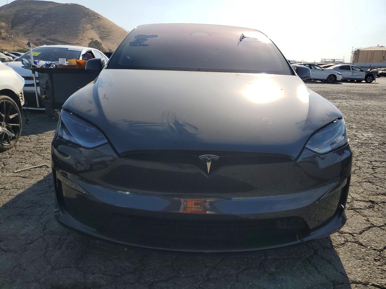 2024 Tesla Model X VIN 7SAXCDE53RF443181 COPART salvage auction — Side, Sc - Salvage Title, sold $30,500 on 2026-09-24 (photo 5)